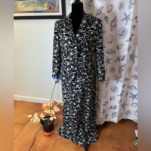 Womens blazer with long skirt which u can make short. Black/white Excellent